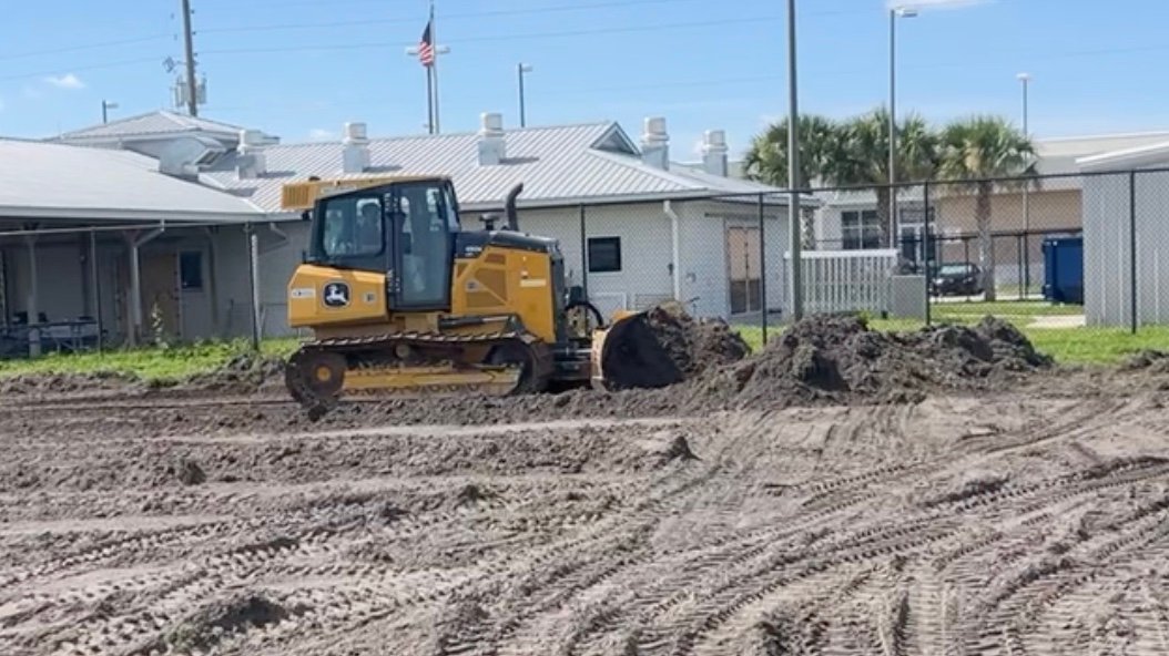 Land grading services in Orlando Fl using bulldozer for building pad and site preparation
